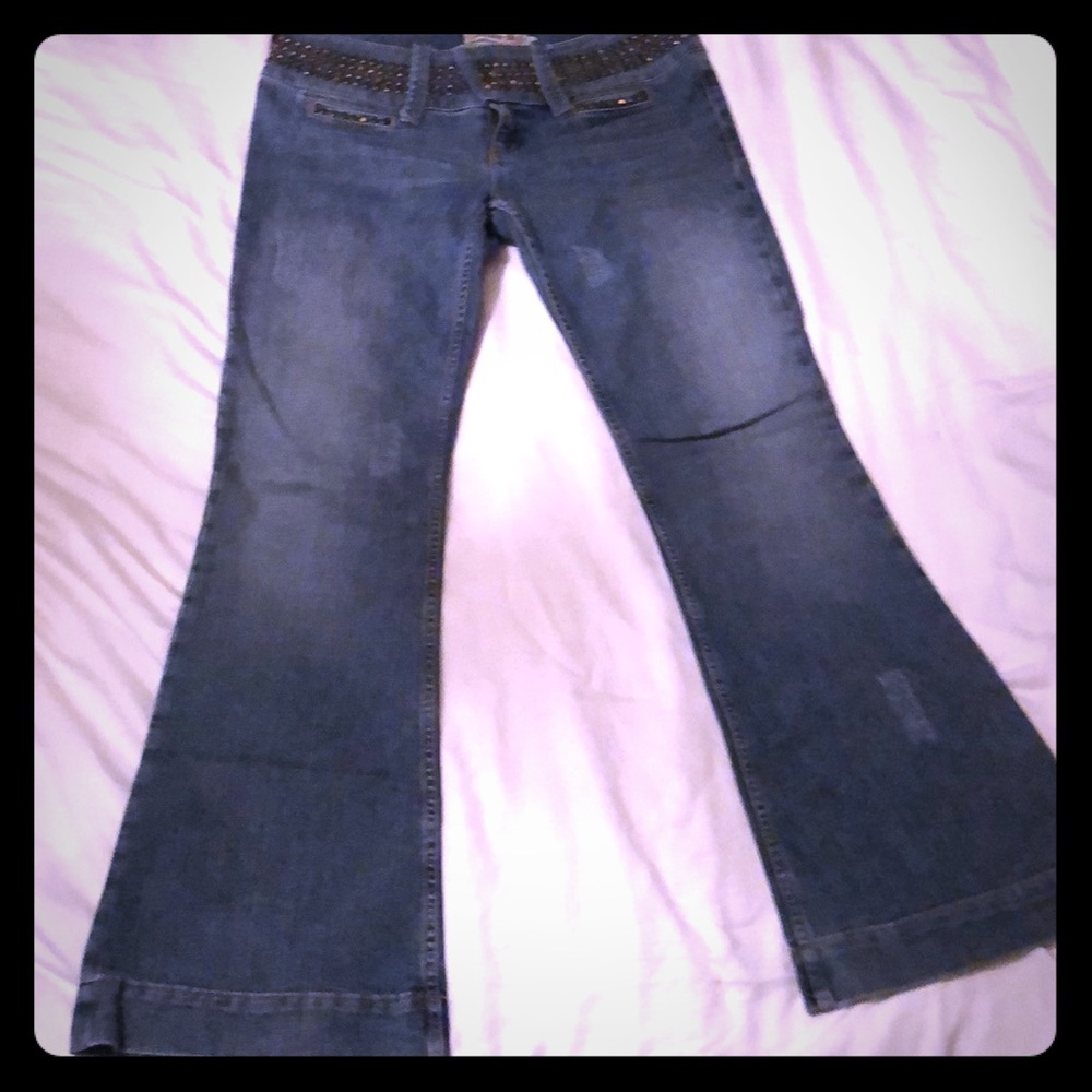 Allen B Schwartz bell bottom studded jeans